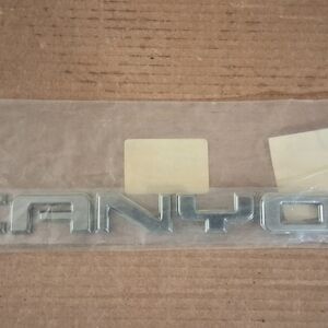 2004-2012 GMC Canyon OEM Namplate "Canyon" For Tailgate Or Exterior Front Doors